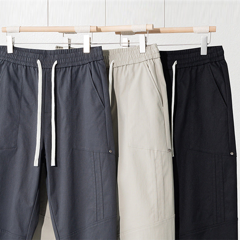 CBA7005-124B 春秋季鉚釘分割拼接束腳褲寬鬆薄款休閒褲(3色)